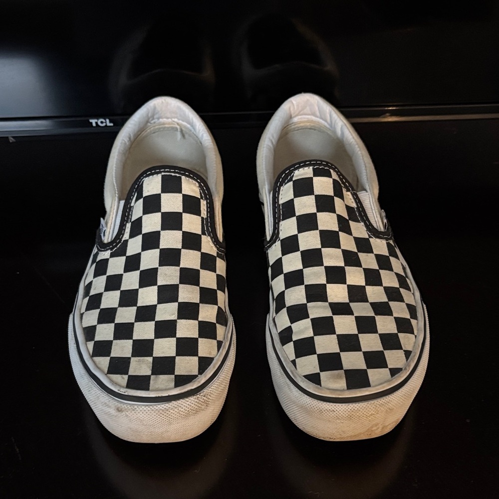 Vans Black and White Checkerboard Slip-On Sneakers